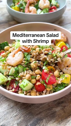 Mediterranean Salad Recipe with Farro and Shrimp - this easy Mediterranean salad is the next recipe in my 30-day Mediterranean diet meal plan! Chickpeas and farro are mixed with chopped vegetables, fresh herbs, and a bold Mediterranean dressing. Chickpeas and farro provide loads of fiber, plant-based protein, vitamins, minerals and antioxidants. And if you add the shrimp, you’ll get another boost of protein! If you want to add shrimp, simply season it with salt and pepper and toss in a little bi