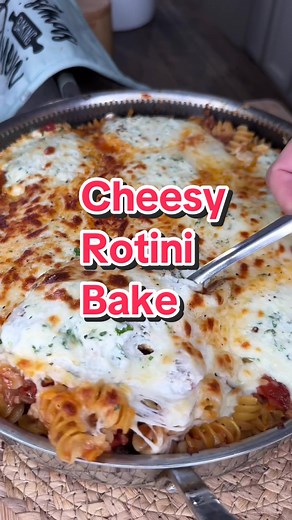 1 tbsp. olive oil 1 lb. of rotini pasta 1.5 lbs. ground beef 1 yellow onion chopped 6 cloves chopped garlic 2 tbsp tomato paste 2 tsp dried basil, 1 tsp of each: oregano, Italian seasoning blend, garlic powder (salt, cracked black pepper and crushed red pepper to taste) 28 oz. can of crushed tomatoes 1 cup of pasta water 2 cups whole milk mozzarella *Cheese Balls: 15 oz. ricotta, 1 cup of shredded mozzarella, 1/2 cup of grated Pecorino or parmesan cheese, 1/4 cup of chopped fresh Curley parsley,