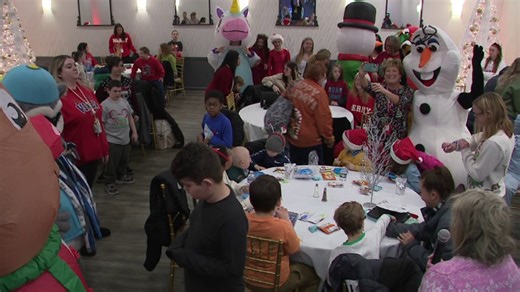 Kids with disabilities enjoy a festive day with Santa at Tobyhanna Army Depot party