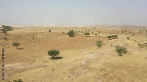 2020 - aerial over the dry savannah landscapes of Senegal, Mali or Gambia in West Africa.