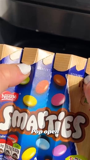 Super easy smartie lava cake 🤤🍫 #reelstrending #fyp #foodtutorials #homemaderecipes, #airfryer #foodie #brownie #fbreels #smarties #easyrecipes #whipcream #reelstrending2025 #quickmeals | Caught Snackin