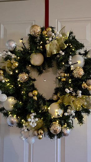 I make customize Christmas wreaths. This is a beautiful wreath with gold, white, and silver color scheme with lights. | Crafts by Angel