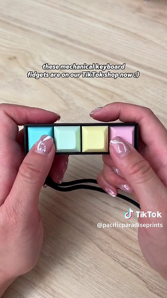 Replying to @Alice🫤 If you ever wanted to fidget with a creamy mechanical keyboard, then you’ll like these mini fidget keychains. This video features our “quiet” switches, which sound and feel like creamy keyboards. The keycap colors are also customizable with lots of possible color combos! (9 key = sky blue, purple, hot pink; 4 key = sky blue, mint, yellow, light pink). Add these cute fidgets to your keychain collection #tiktokshopsummersale #tiktoksummersale #tiktokshop #mechanicalkeyboard #k