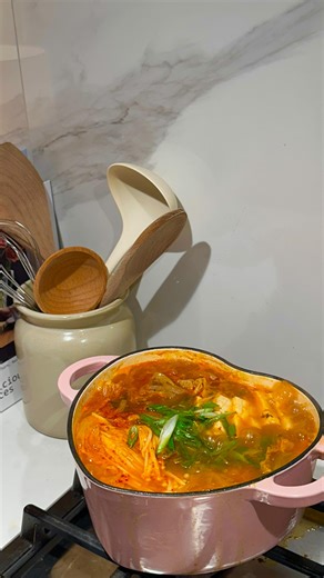 Rosie Le 🍜 on Instagram: "Kimchi Jjigae recipe below 👇💓 On a cold day, this kimchi jjigae feels like a warm hug in a bowl. Tangy kimchi, tender pork, silky tofu, and a rich, spicy broth come together to comfort your tummy and your soul. Every spoonful is cozy, flavorful, and impossible to resist - the ultimate winter warmer. Kimchi Jjigae (2 servings) Ingredients: • 200g pork belly • 1 cup sour kimchi • 1 small onion, sliced • 1–2 garlic cloves, minced • ½ tsp grated ginger • 1 tbsp gochugaru