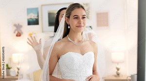 Bride, wedding and woman helping with veil in dressing room smile for special day. Happy women love and bridesmaid support or helping bride with fabric head piece for beauty, marriage and happiness