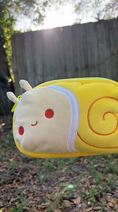 Snailed it 🐌 💛 Check out our collection of plushie fanny packs! TeeTurtle Plushiverse https://teeturtle.com/collections/plushie-fanny-packs ____________________ #plushiverse #teeturtle #snail #fannypack #crossbodybag #beltbag #plush #plushies #gifts #shopping #snails #cute #musthave | TeeTurtle