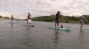 Stand up paddleboarding is making waves around the world. The watersport combines certain aspects of canoeing and surfing. More people are trying stand-up paddleboarding in the Yukon than ever before. That's thanks to an entrepreneur in Whitehorse. Reporter Karen McColl and Videographer Mike Rudyk went to check it out and discovered you can do more than just paddle on a paddleboard. | CBC Yukon