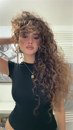 Curls Are Back: Easy Curly Hairstyles with Bangs