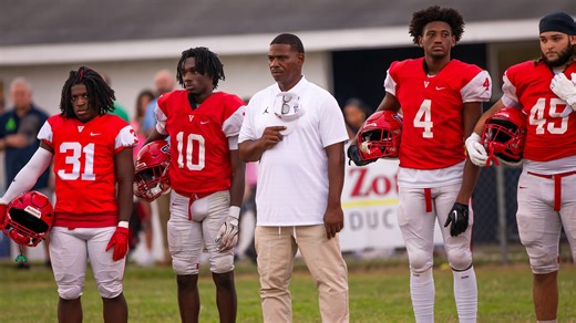 Vanguard football celebrates head coach Edwin Farmer's 100th win