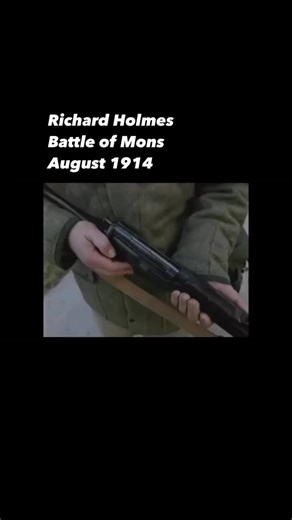 Richard Holmes, the incomparable British military historian, at the Mons canal, with a rifle, describing the battle. firstworldwar #ww1 #historymatters #battlefieldguide #walktheground | Walking The Ground