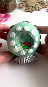 1.6M views · 6.4K reactions | Shaker snow globe cupcakes. I am determined to get that sugar window perfect one day. I’m using a silicon mold to dome the buttercream and Reese’s pieces for the bottom thats been dusted with edible dusts. #snowglobe #christmascupcakes #cupcakes #buttercreamart | Sophia Mya Cupcakes | Facebook