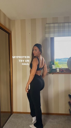 Emma Mailer | Online Coach on Instagram: "@myprotein activewear try on haul🤭🤸🏽‍♀️ these pieces wow i’m OBSESSED 1. Mp ruched front flared leggings & MP tempo twist front sports bra 2. MP active shorts buttermilk & MP active back buttermilk 3. MP active shorts deep purple & MP active square neck vest deep purple 4. MP tempo strappy sports bra & MP ruched front shorts 5. MP tempo halterneck open neck sports bra 6. MP straight leg joggers / cloud 7. MP straight leg joggers / sandstone 8. MP life
