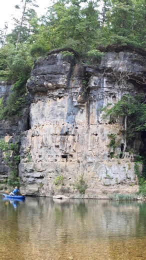 This is a massive bluff on Jacks Fork. If you see at the end I'm the little blue dot. This was from Buck Hollow to Blue Spring near Mt View, Mo. Full videos on YouTube. Link in the comments | Show Me Creeks