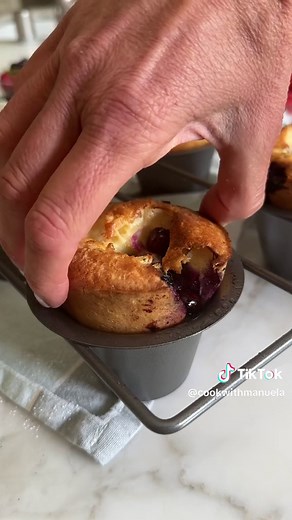 ✨Blueberry Popovers✨ As promised, here is the full video recipe for these fluffy, tall and airy popover exploding with sunkissed sweet blueberries, served warm with whipped cream 😍 NEWEST recipe on my website Happy weekend everyone 😘 INGREDIENTS * 2 tablespoons (30 g) unsalted butter * 1 1/2 cups (180 g) all-purpose flour * 2 tablespoons maple syrup * 4 large eggs * 1 teaspoon vanilla extract * 1/4 teaspoon salt * 1 1/4 cups (300 ml) milk * about 1/2 cup blueberries * powdered sugar, for servi