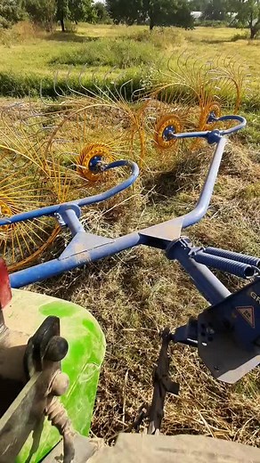 Hay Baler in Action: Efficiently Collecting Hay