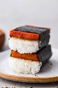 Spam musubi is a classic Hawaiian snack or on-the-go lunch made with a slice of seared spam on top of rice, all wrapped in crispy seaweed! https://therecipecritic.com/musubi/ | Tried and True Recipes