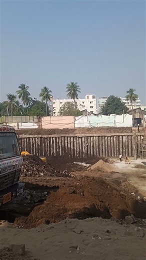 Contiguous pile wall supporting deep excavation