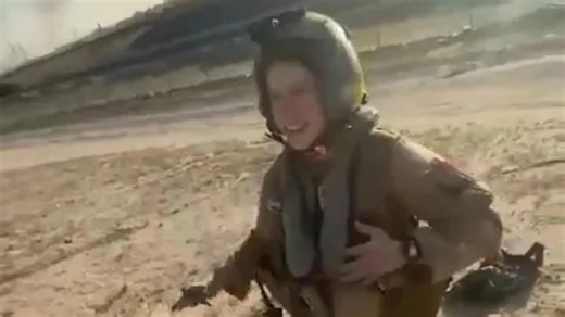 Moment female US pilot is thanked by Kuwaiti locals after jet is shot down