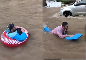 Koh Samui backpackers think filthy flood is their own personal waterpark (VIDEO) | Coconuts