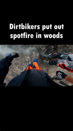 Dirtbikers put out a burning spot fire in the woods while riding