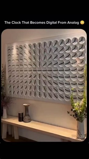 Mr.Trend on Instagram: "What looks like a wall of tiny analog clocks is actually a single, mesmerizing digital timepiece. Each pair of clock hands moves in perfect harmony with the others, coming together to form the current time in a digital-style display. Between transitions, the hands dance in mesmerizing synchronized patterns - blending precision engineering, kinetic art, and minimal design. This installation, known as the ClockClock 24, reimagines how we perceive time - turning every passin