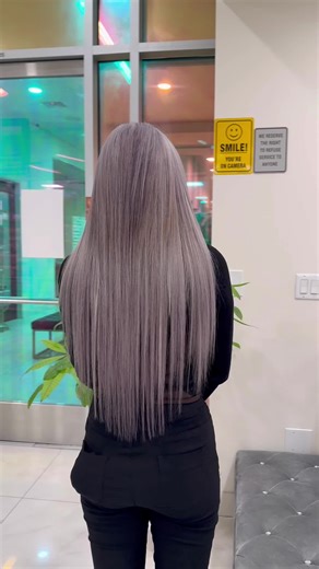 ✨ Corrective Blonding to Purple Silver ✨ This client had multiple rounds of highlights over time, which led to uneven color, patchiness, and significant damage, with some areas not lifting properly at all. Her goal was a full transformation to a cool gray tone. To achieve this safely, we performed three carefully controlled bleaching sessions, focusing on evening out the base while minimizing further damage. Once the canvas was balanced, we applied a purple silver toner to create a clean, cool-t