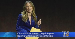 Olivia Wilde served with custody papers on-stage at CinemaCon