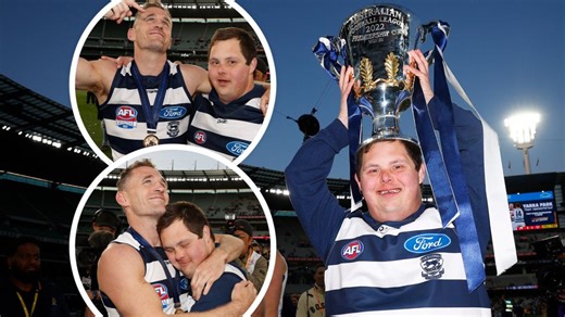 Cats water boy, Sam, joins Geelong players in celebration