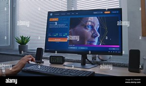 Adult woman enters prompt in artificial intelligence chatbot on PC. AI video generator generate detailed high-quality video of woman face with digital overlay. From text prompt to generated video Stock Photo - Alamy