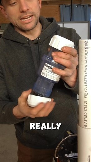 Now we're adding the quiet check valve (QCV1 50 from Liberty) to minimize that annoying thumping sound. What I love about this valve is that it’s made from clear plastic, so you can easily see what kind of water the sump pump is pumping out—whether it's sandy, murky, or clean water. Next, we’re installing the float switch for the backup pump. The reason I go with 11 inches for the combined pieces is to ensure the pump sits just above the basin with a few inches to spare. Plus, the bottom of the 