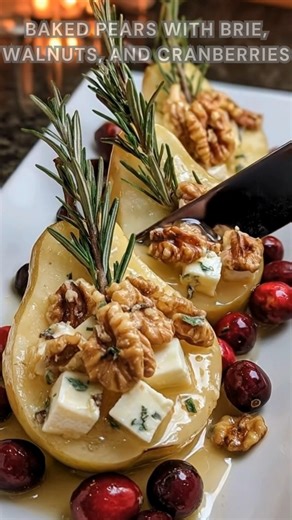 Pears halved and brushed with honey cinnamon. Add Brie, walnuts, cranberries. Bake at 375°F for 20–25 minutes. Warm, melty, sweet, golden soft fruit with rich creamy centers. Ingredients ➤ 3 ripe pears, halved and cored ➤ 1 tbsp olive oil or melted butter ➤ 1 tbsp honey or maple syrup ➤ Pinch of ground cinnamon ➤ 4 oz Brie cheese, cubed ➤ 1/3 cup toasted walnuts, chopped FULLL Recipe in First Cօʍʍеոτ 👇👇 | Nessy Recipes