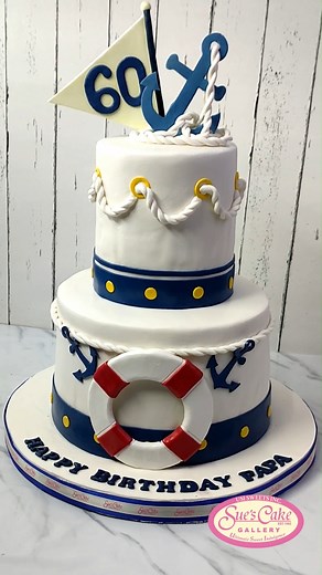 This two-tiered cake features handcrafted nautical-themed embellishments, such as ropes and anchors, and is ideal for any marine occasion. 🚢🌊 #IloiloCakes #TheresNoCakeLikeSues #nauticalcake #marinecake #customcakes #customizedcakes | Suisse Cakery