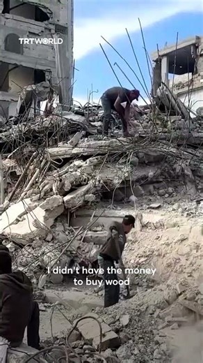Displaced Palestinians scavenge the debris of destroyed buildings to make tents