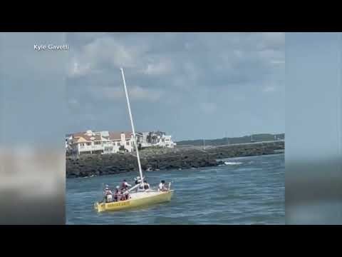 Dramatic rescue from sinking sailboat