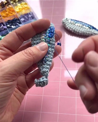 Sewing sequins on crochet