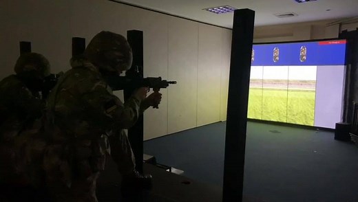 The DCCT (Dismounted Close Combat Trainer) is a computerised version of a live firing range. It allows troops to better hone their skills without the added pressure of temperature and weather. They will subsequently move on to the live firing ranges outdoors. #ForgetCallOfDuty Footage from C Company, Balham | 5 Fusiliers