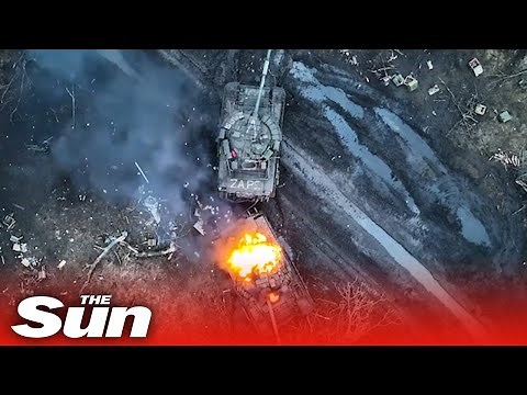 Down the hatch! Ukrainian pinpoint drones blow up Russian tanks