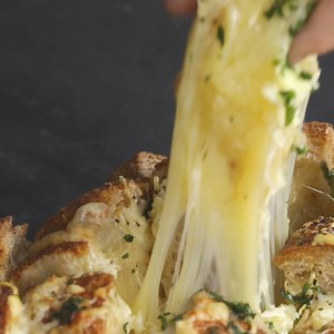 Sometimes you just need to grab ahold of cheesy bread... | Tasty