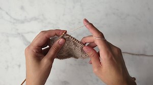 To show off our newest yarn, Season Alpaca, we knit up a new version of our Trellis Scarf + Wrap and created a new video tutorial showing how to "Knit 1 Under Loose Strand," a key step of the pattern. Watch the whole video and get our free scarf pattern here... https://www.purlsoho.com/create/2017/09/06/trellis-scarf-wrap-in-season-alpaca/ | Purl Soho