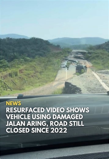 Headline: Resurfaced Video Shows Vehicle Using Damaged Jalan Aring, Road Still Closed Since 2022 Jalan Aring in Gua Musang, which leads to the Terengganu border, remains closed to all vehicles after being severely damaged by land subsidence in December 2022. A video that recently went viral shows a four-wheel-drive vehicle using the badly damaged road. It’s not certain when the video was recorded. Kelantan Public Works Department (JKR) director Ir Nik Badlihisham Nik Ismail said the road has nev