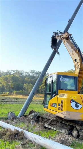 Heavy Machinery at Work: Installing a Concrete Utility Pole Seamlessly