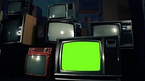 Old TV Green Screen and Retro Television Stack. Green Tone. Dolly Shot. You can replace green screen with the footage or picture you want with “Keying” effect (check out tutorials on YouTube).