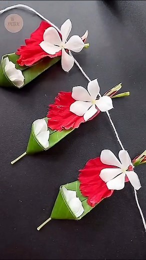 16K views · 877 reactions | ✨ Handmade toran with mango leaves, hibiscus, and nayanthara flowers  Natural • Eco-friendly • Perfect for festive décor  #ToranDecoration #MangoLeafToran #FlowerToran #EcoFriendlyCraft #DIY #HandmadeArt #CreativeIdeas #CraftLovers #ArtAndCraft #MadeByKaushika #ReelInspiration | Made by Kaushika | Facebook