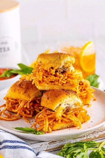Spaghetti and meatball sliders are an example of when two good things come together to make something even better! https://cookingwithcarlee.com/spaghetti-and-meatball-sliders/ | Cooking With Carlee