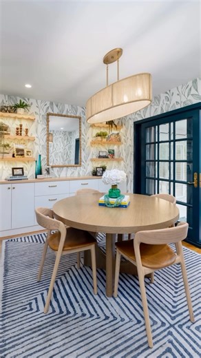 Interior Design Studio on Instagram: "California Vibes through and through. This was a fun project as it was another awesome client that loves color and various textures and patterns. We took a California Surf meets Boho plant lover approach on this one. It’s fun, whimsical and functional! The table expands for more guest and the cabinet stores all those things they need close by, the chairs and rug are easy to clean, the mirror brightened the space and the scalloped shelves display family goodi