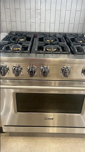 Viking Pro 5 series Range Hood and Convection Freestanding Gas Range.