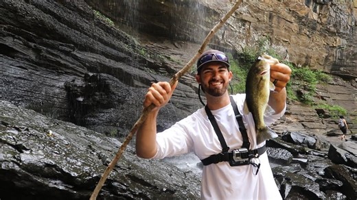 Exploring a raging waterfall leads to fishing with primitive sticks