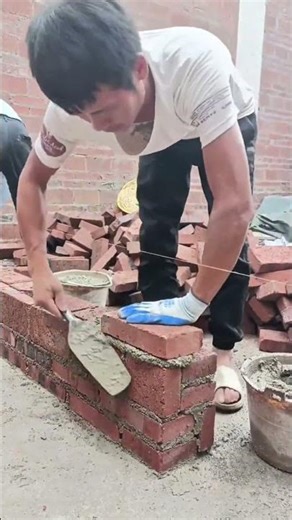 Lay the exposed bricks to build a brick wall, ensuring the joints are tightly sealed #construction