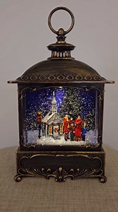 Gerson International Lighted Christmas 12" Battery Operated Water Lantern Snow Globe with Swirling Glitter and Timer Feature Church Carolers
