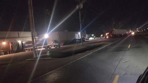 Semi stuck in the ditch in front of Pope Distribution, 1600 W. Chestnut. | NewsLink - Enid